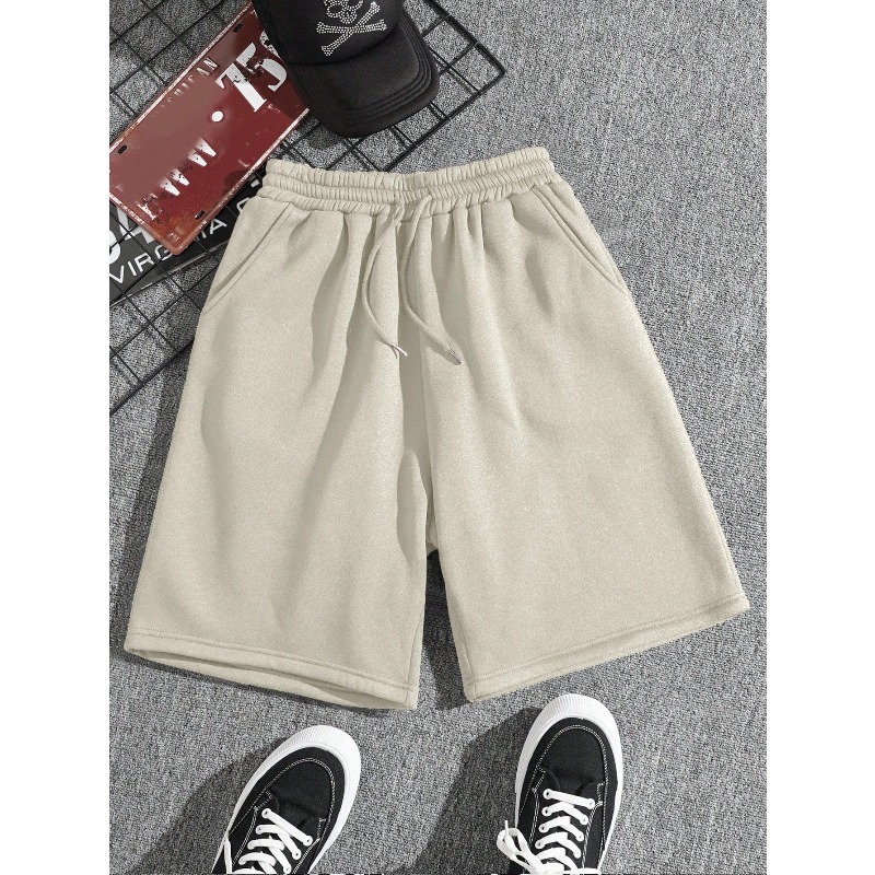 Shorts décontractés pour hommes, noir et blanc, tendance et polyvalents, style sportif. Nouveaux shorts d'été adaptés aux hommes et aux femmes