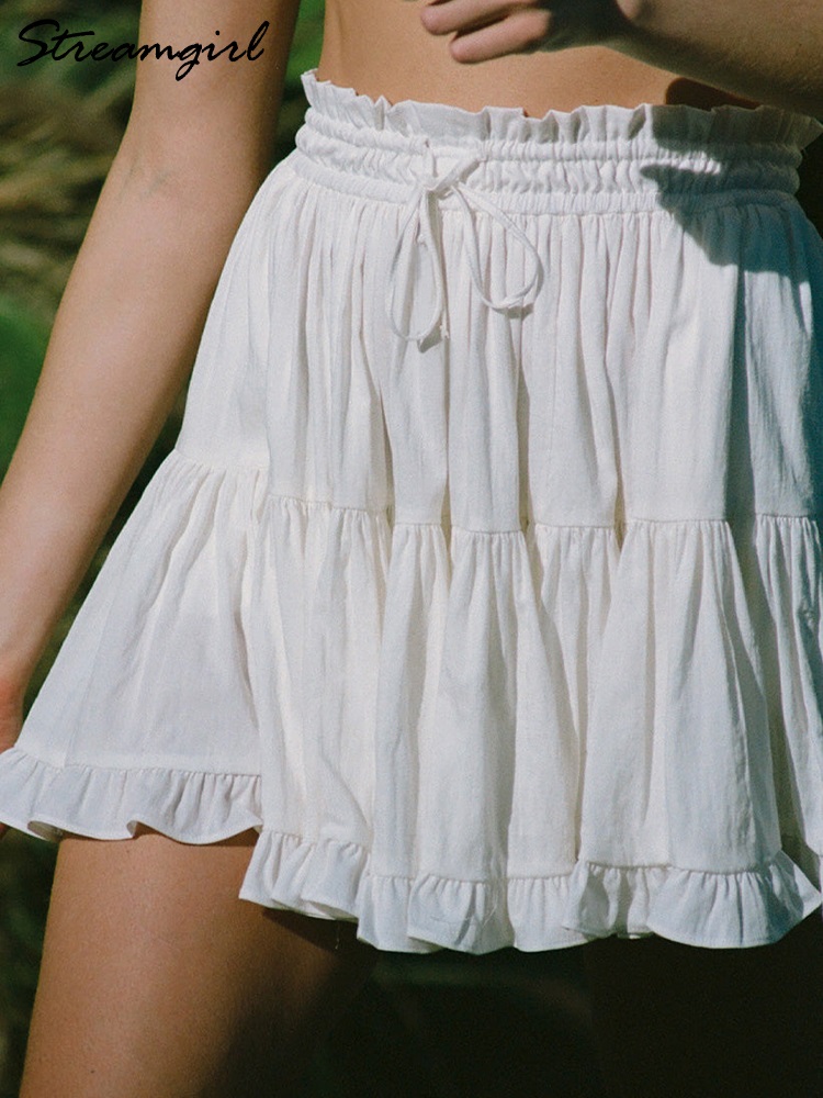Femmes Mini jupe à volants avec Short été 2025 taille haute blanc gâteau jupe épissage jupes de plage courtes pour les femmes Vintage