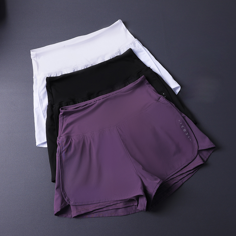 Short 2 en 1 pour femme avec poches – Léger, respirant, ample, anti-exposition, côté fendu pour le yoga, la course à pied, la salle de sport
