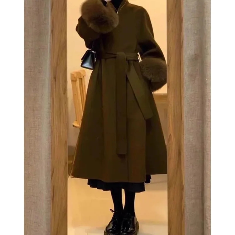 Femmes automne hiver manteau de laine 2025 nouveau haut de gamme Style français manches de fourrure mi-long manteau de laine femmes manteau Long vêtements d'extérieur amples