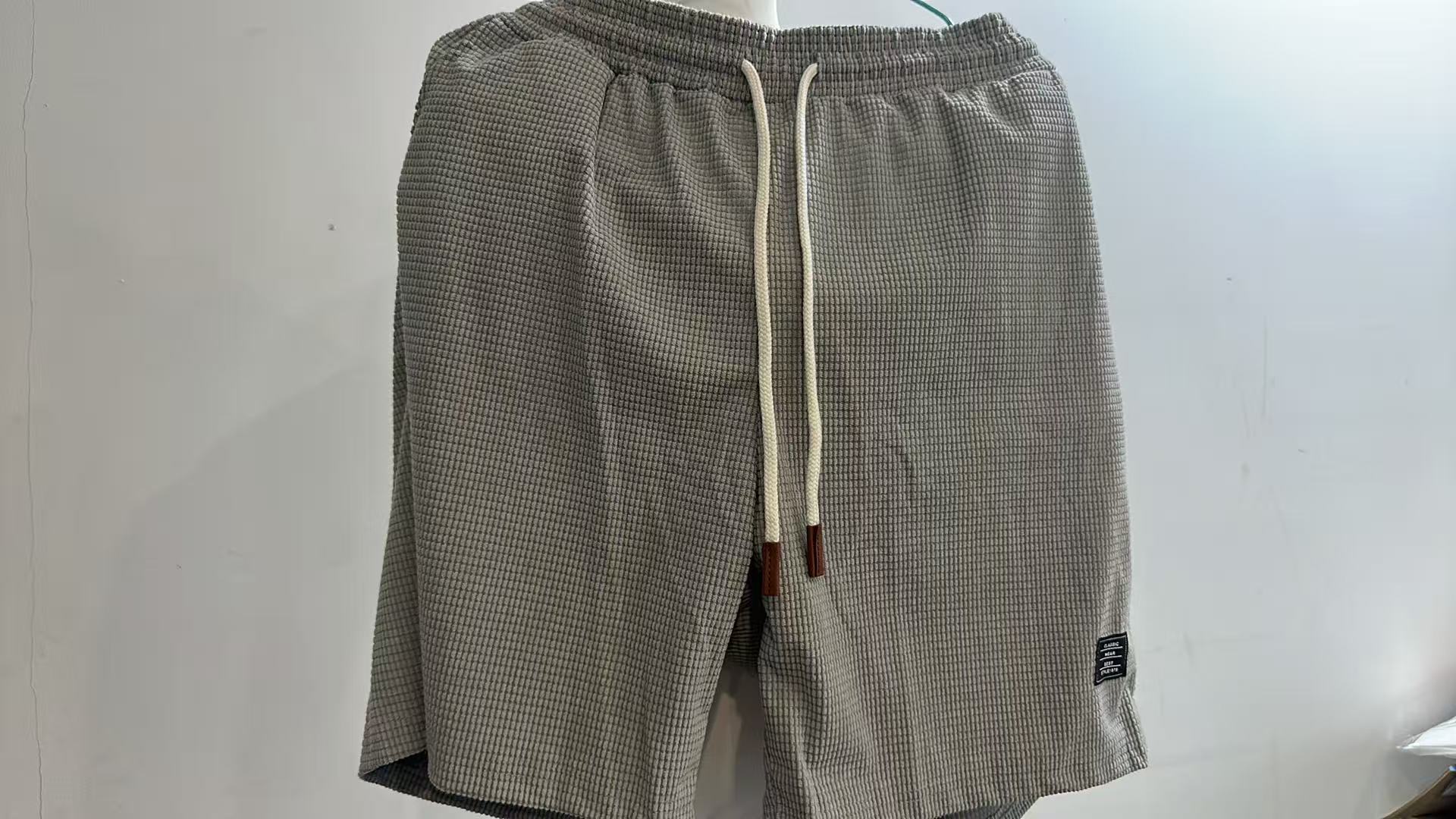Pantalons décontractés pour hommes, shorts de plage, vêtements de sport, tissu texturé à la mode, respirant