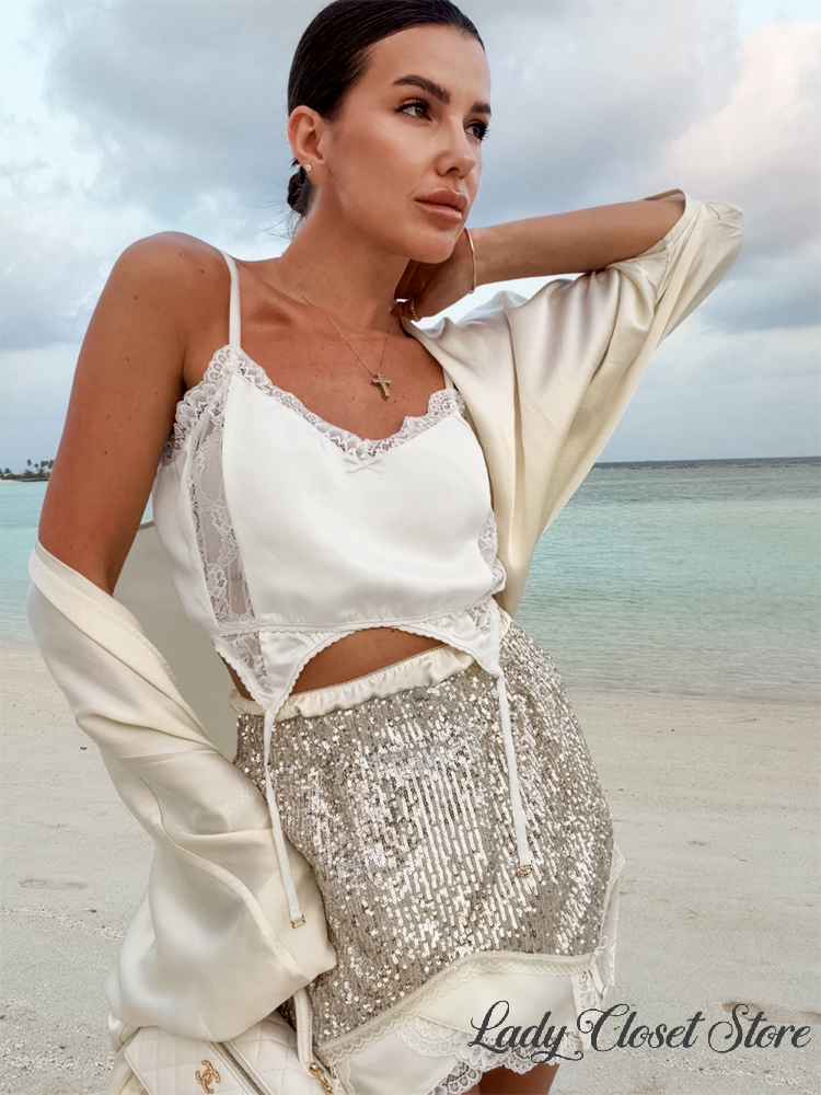 Ensemble jupe et haut sexy pour femme, couleur unie, col bateau, gilet à lacets ajusté à la taille, jupes plissées moulantes, tenue chic été 2026