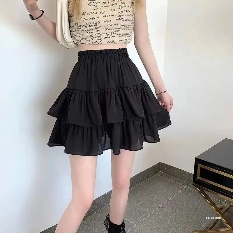 Jupe trapèze plissée blanche pour femmes, à volants, douce, Style Preppy, taille élastique, Slim, Simple, décontractée, vente en gros, été