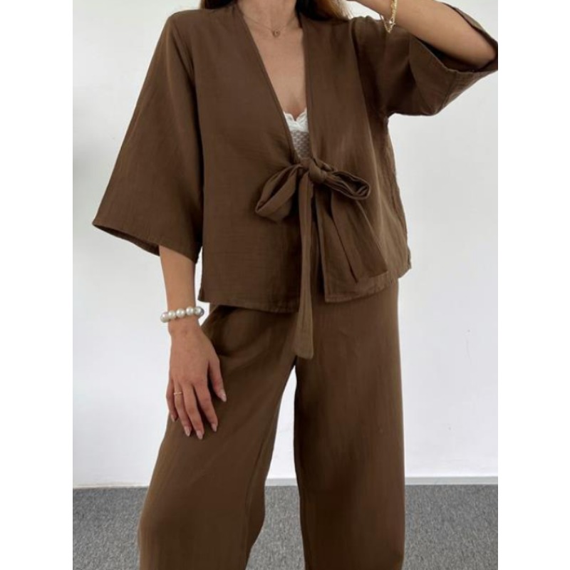 Nouvelle tenue élégante pour femme : costume à col en V qui affine la taille et met en valeur les courbes