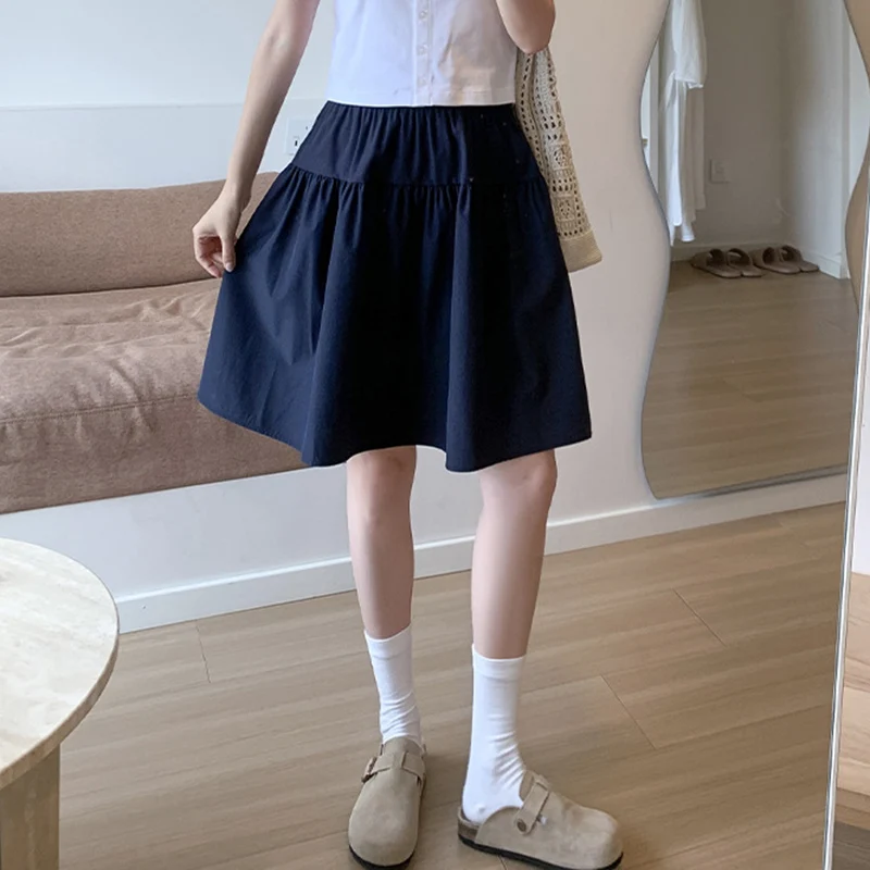 Style collégial ample une ligne jupes femmes été élastique taille haute jupes plissées femme japonais solide au-dessus du genou longueur jupe