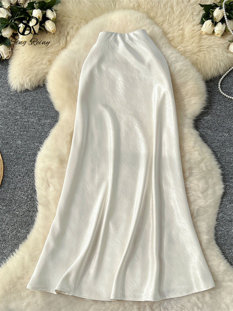SINGREINY Senior solide Satin jupe taille élastique 2025 plus récent Frence élégant femmes mode bases bureau dame maigre jupe Midi