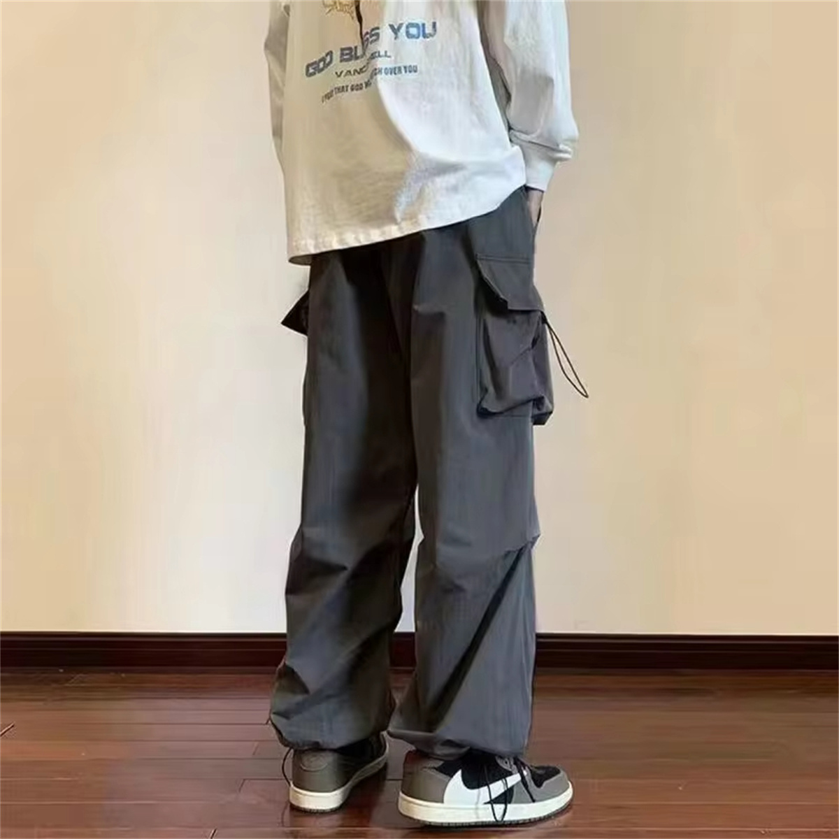 Streetwear 2024 printemps sarouel pantalons décontractés hommes taille élastique couleur unie Cargo pantalon Multi poche ample Baggy pantalon pour les femmes