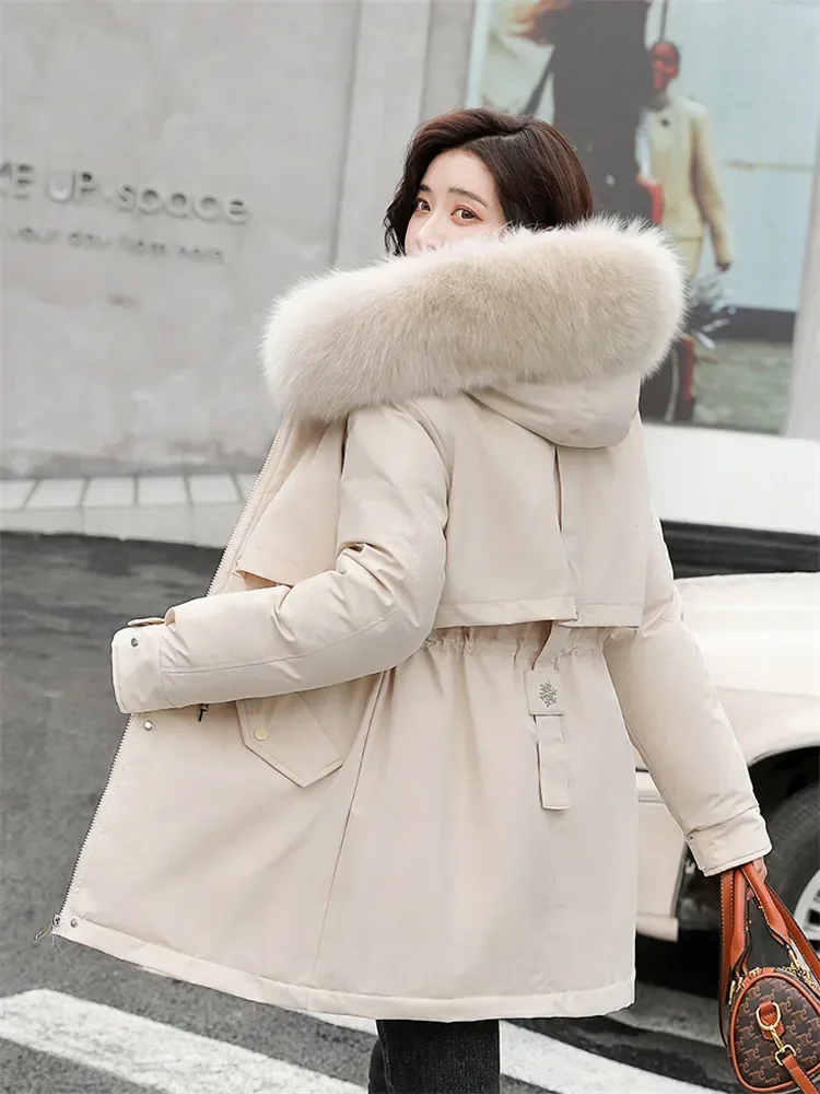 Manteau d'hiver à prix réduit en promotion pour femme, beige, avec laine, chaud et épais, parka à capuche en fourrure, nouvelle mode 2026, ceinture, manteau en coton ajusté