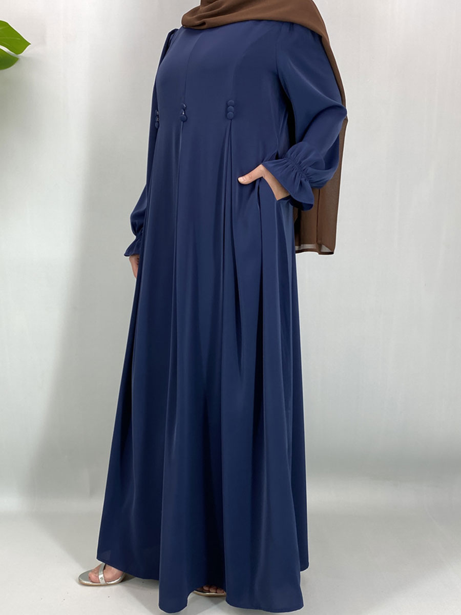 Abaya de style Dubaï modeste, robe maxi islamique tendance pour femmes musulmanes avec détails boutonnés et poches