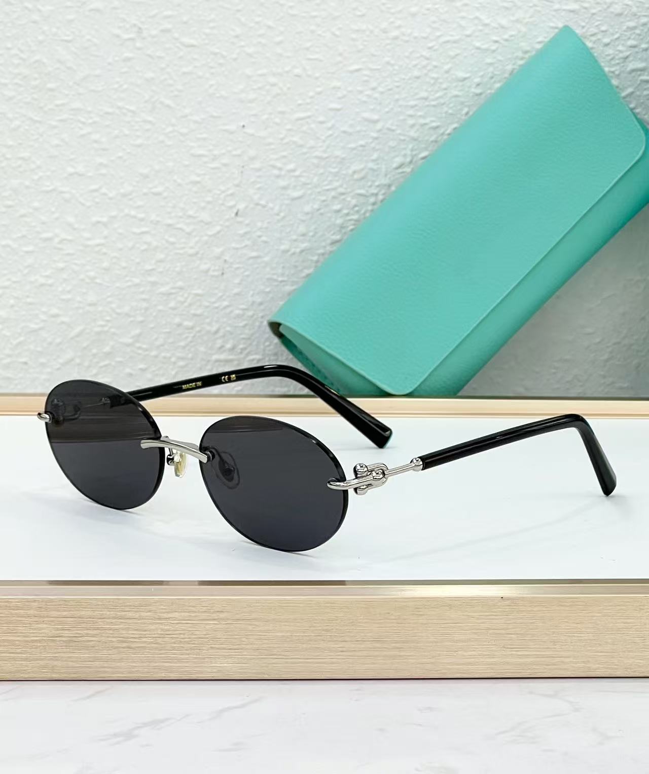Lunettes de soleil œil de chat rondes sans monture pour femmes, monture circulaire en alliage, élégantes, décontractées, pour le voyage
