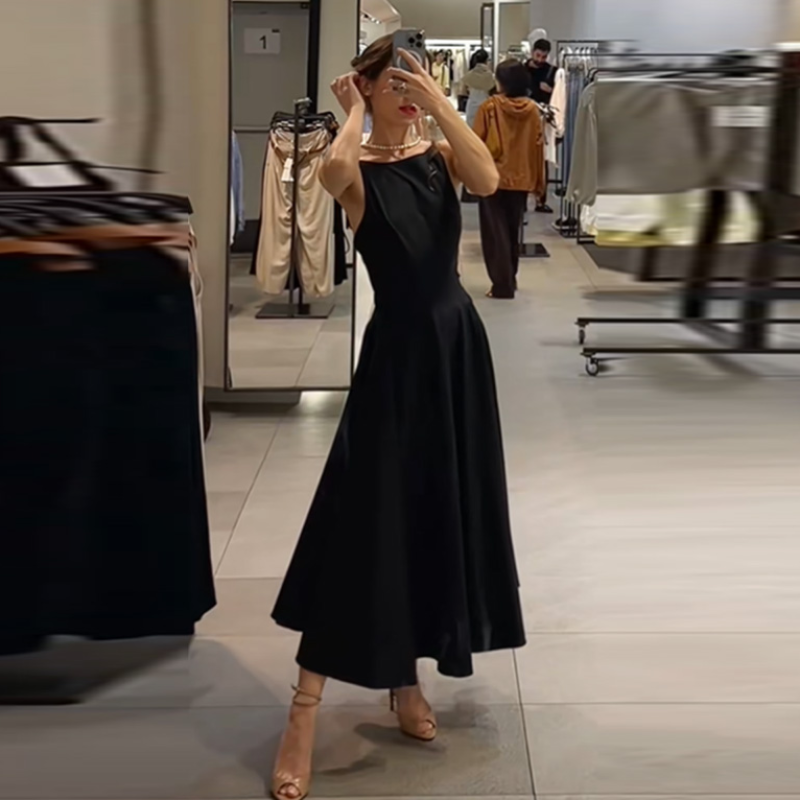 Robe midi noire chic et élégante sans manches coupe trapèze classique pour femme – Tenue intemporelle décontractée et tendance pour l'été et le bureau