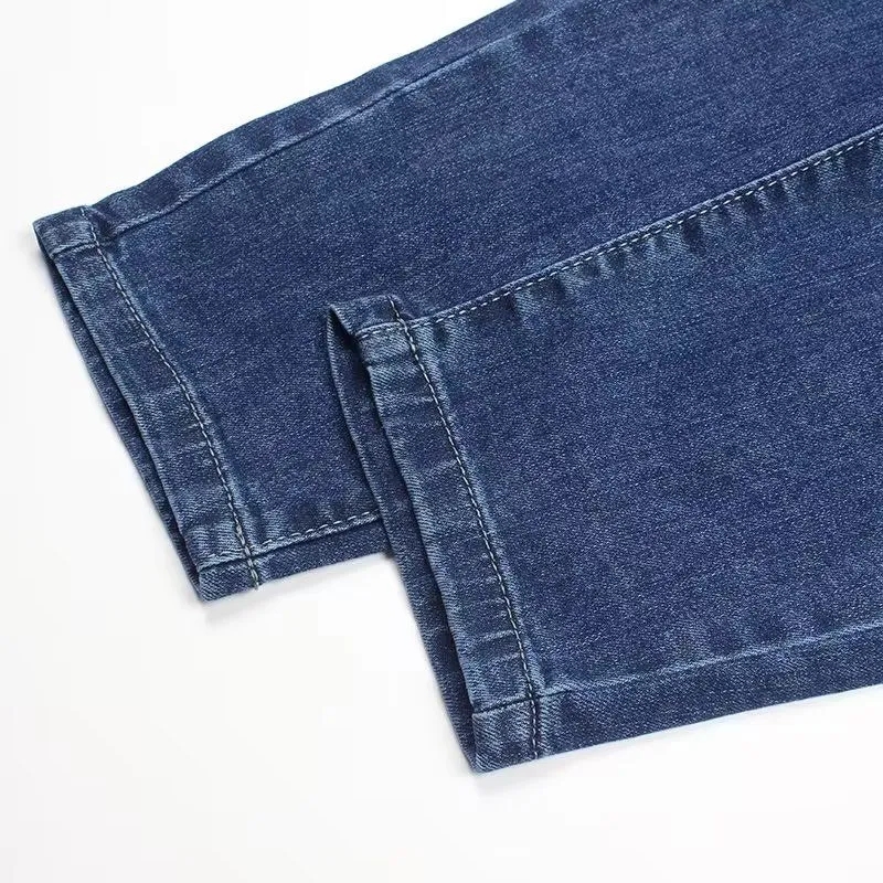 Jean pour femme Streetwear Printemps Automne 2026 Nouveau Pantalon Harun élastique taille haute en denim décontracté à poches coupe 7/8