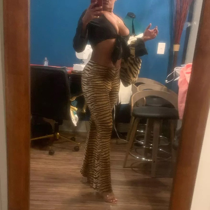 Nouveau pantalon décontracté taille haute, élégant, ajusté, imprimé avec des motifs serpent et jambes évasées.