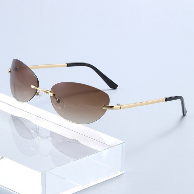 Lunettes de soleil sans monture pour femmes, verres ovales dégradés, style Y2K, futuristes, sexy, style Spice Girl, protection UV, lunettes de soleil tendance