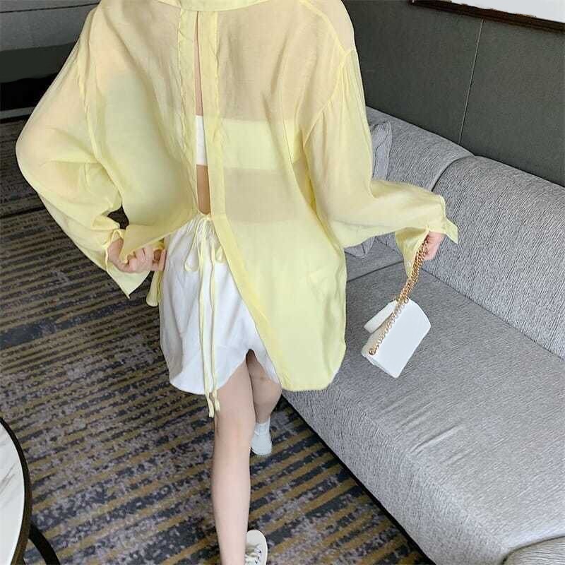 Femmes mode coréenne dos fendu à lacets chemises été mince à manches longues crème solaire chemise femmes décontracté ample vacances plage Blouse