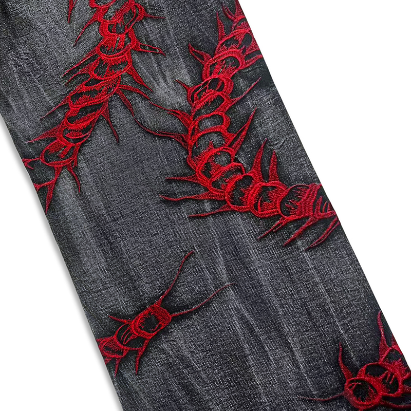 Jean brodé rouge à motifs d'épines, style industriel lourd européen et américain, pour hommes, noir délavé, pantalon de rue personnalisé.