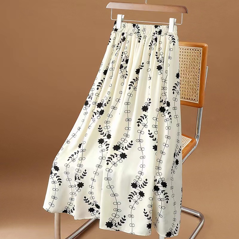 Jupe d'été pour femme en mousseline, style vintage, imprimé floral, taille haute élastique, décontractée, mi-longue, coupe trapèze, pour la plage
