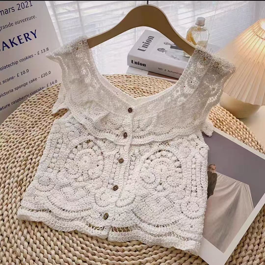 Mode coréenne sans manches tricoté hauts simple boutonnage décontracté femmes Blouse été crochet fleur chemise creuse