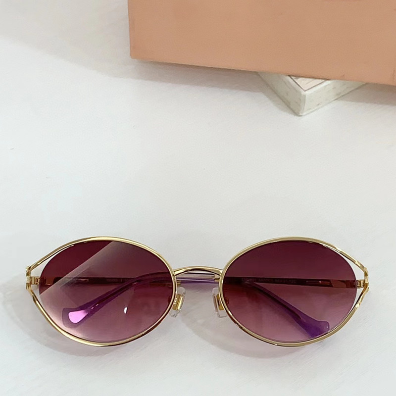 Lunettes de soleil rondes européennes et américaines pour femmes, au style haut de gamme, monture ovale en métal, polyvalentes, tendance et rétro.