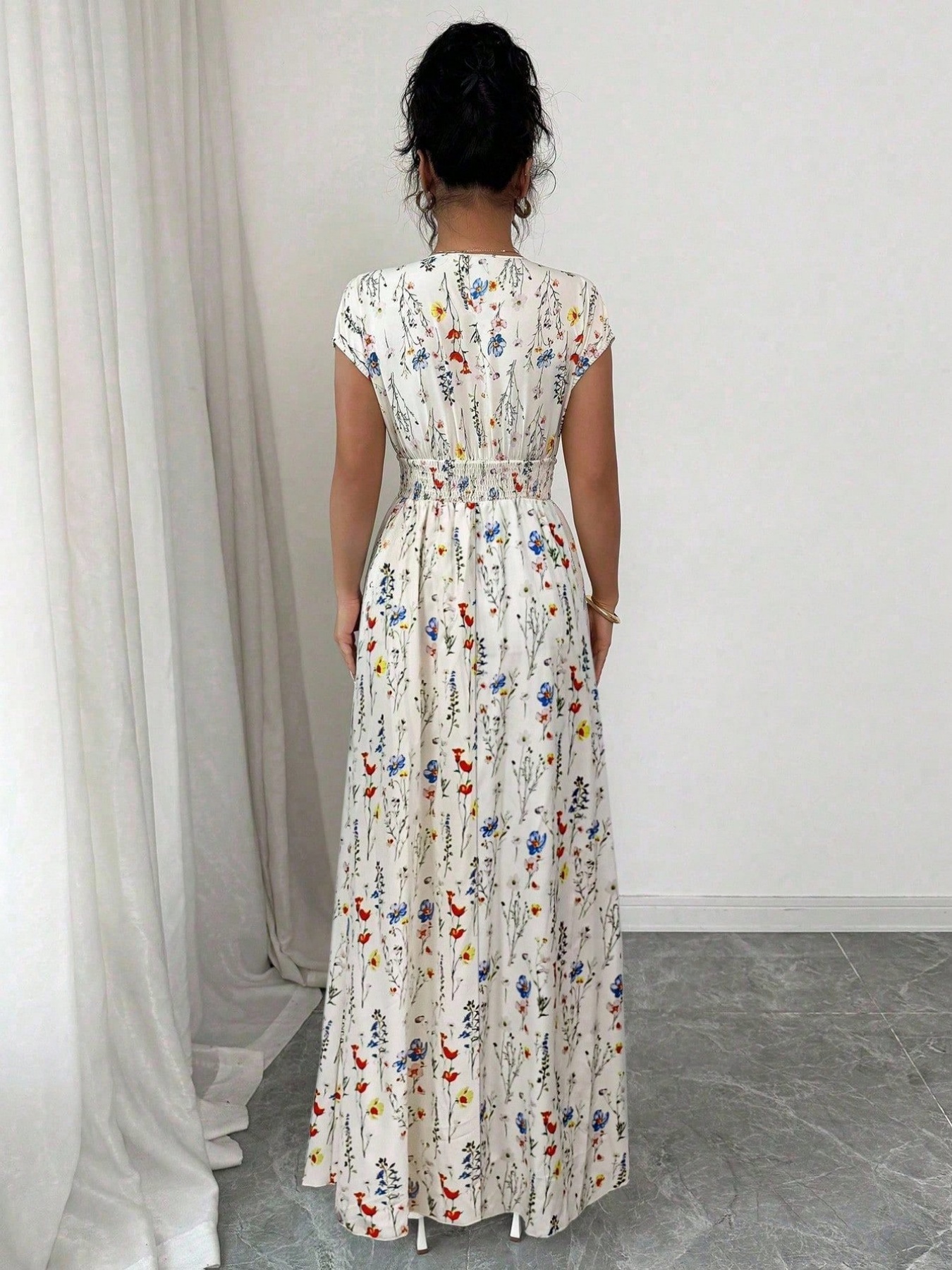 Nouvelle collection transfrontalière de vêtements pour femmes : Combinaison longue élégante à fleurs, col en V et taille cintrée, style français
