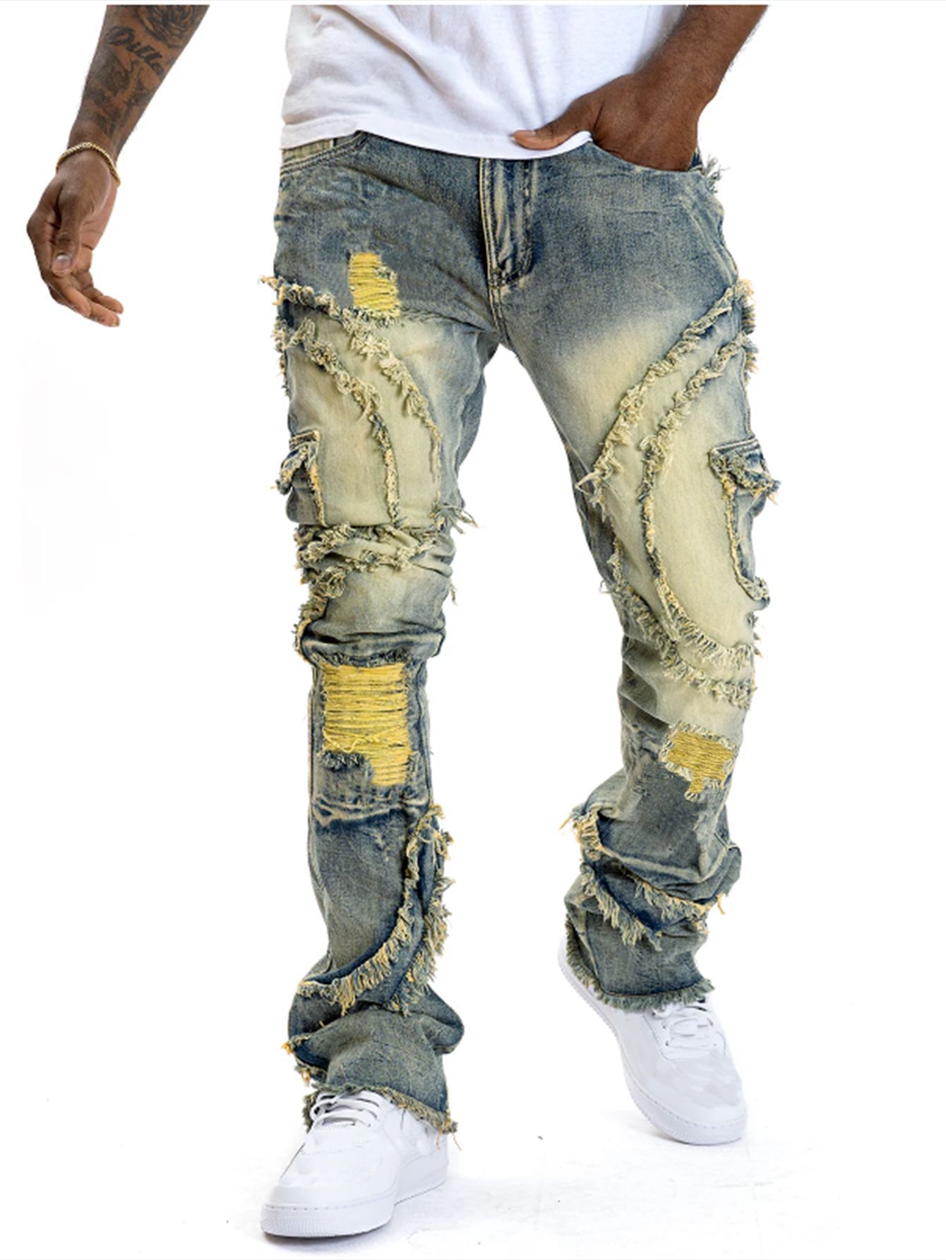 2025 Nouveaux jeans décontractés pour hommes européens et américains, mode punk de rue, rétro, trou déchiré, jeans élastiques à pampilles légèrement évasées