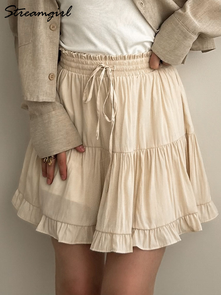 Femmes Mini jupe à volants avec Short été 2025 taille haute blanc gâteau jupe épissage jupes de plage courtes pour les femmes Vintage