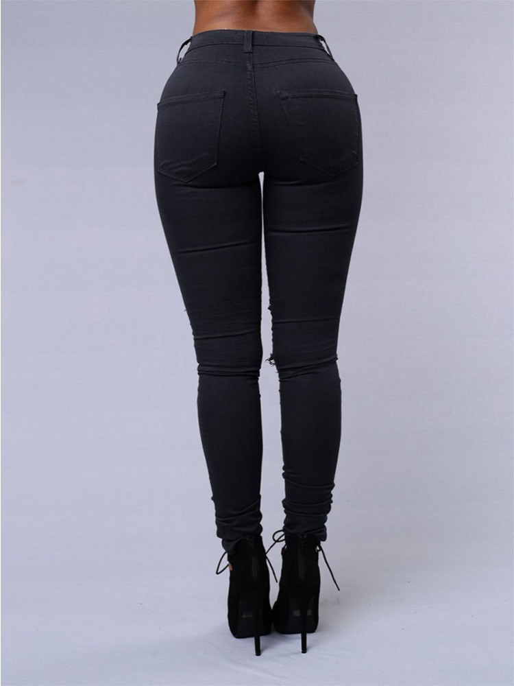 Jean polyvalent de couleur unie pour femmes, pantalon crayon ajouré européen et américain, coupe cintrée minimaliste