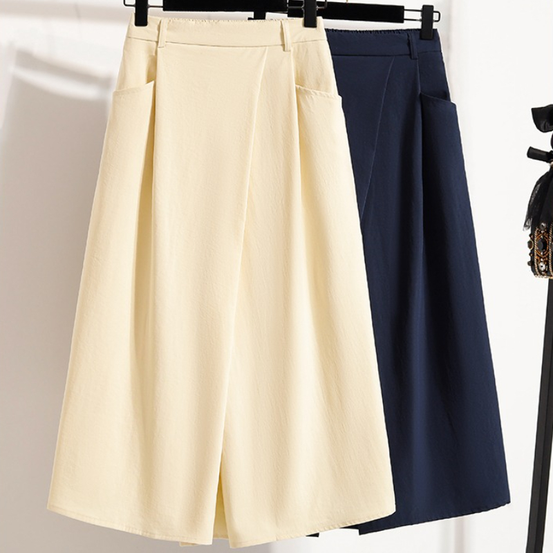 Été femmes grande taille jupe 2026 nouvelle taille haute irrégulière mi-longue jupe femme taille élastique une ligne plissée grande taille jupes