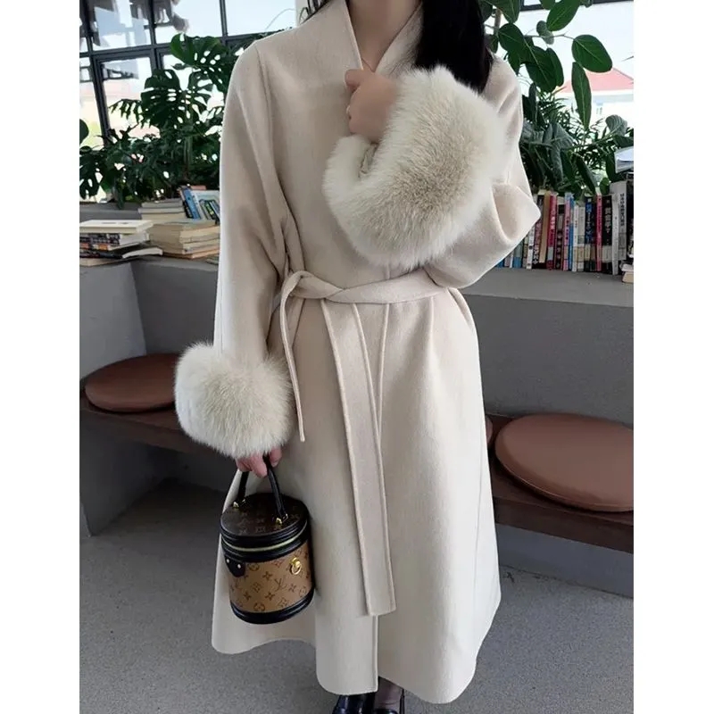 Femmes automne hiver manteau de laine 2025 nouveau haut de gamme Style français manches de fourrure mi-long manteau de laine femmes manteau Long vêtements d'extérieur amples
