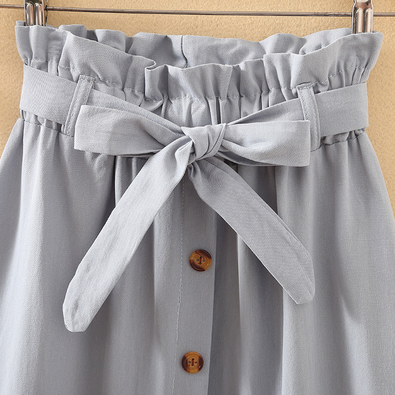 Jupes mi-longues pour femmes, longueur aux genoux, boutons élégants coréens, taille haute, jupe d'école plissée