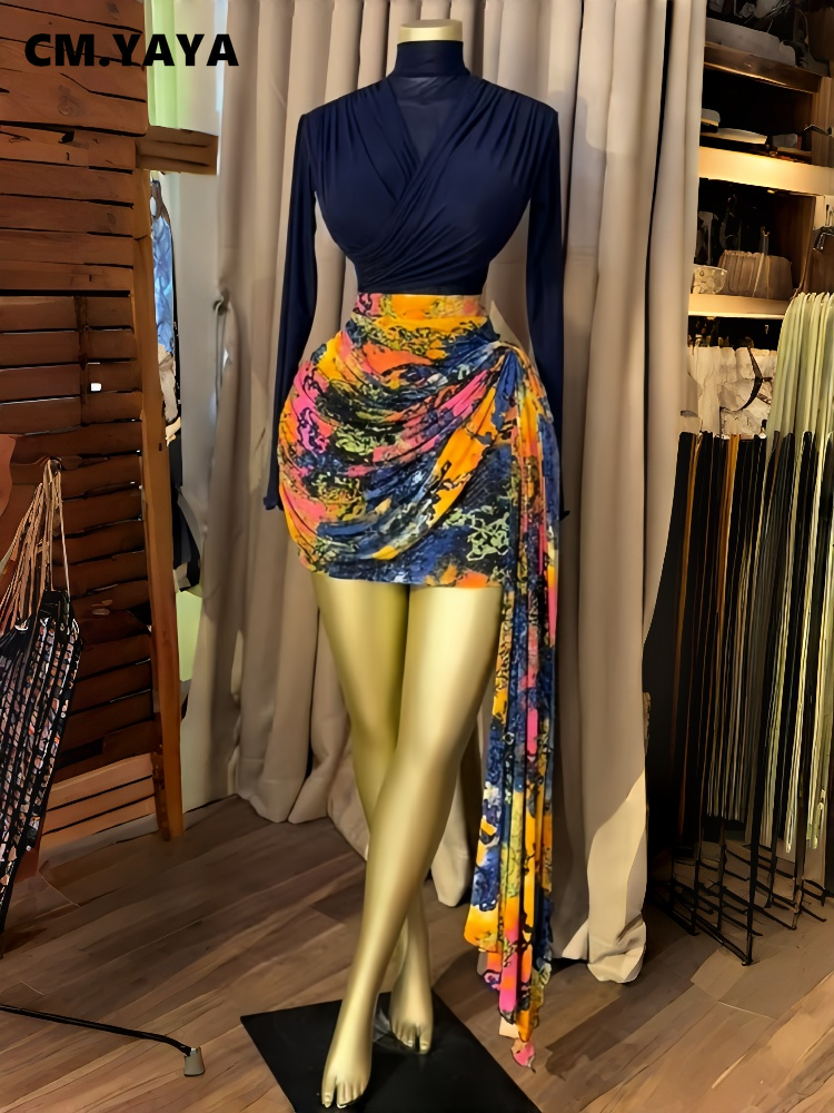 Ensemble de vêtements pour femmes CM.YAYA : hauts + jupe longue ou mini jupe moulante plissée à rubans, ensemble 2 pièces pour les vacances.