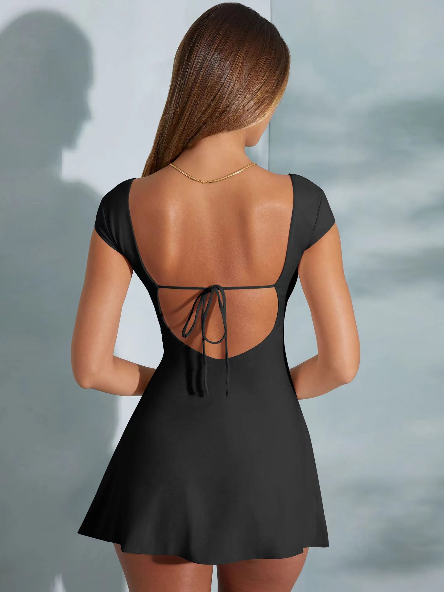 Jupe trapèze à manches courtes, dos nu, style minimaliste, à la mode et sexy, haut de gamme, robe pure et luxueuse pour femmes, été