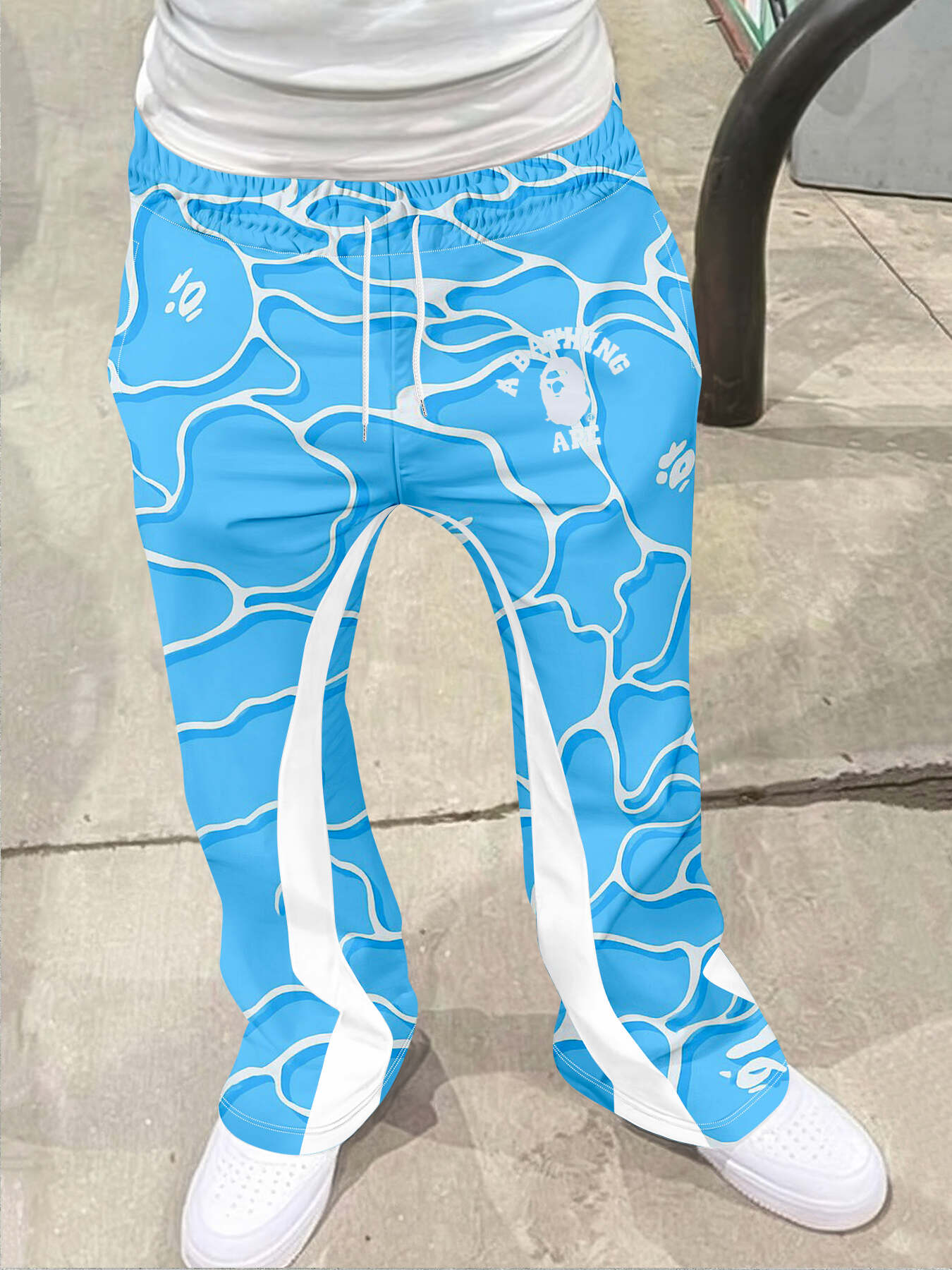 Pantalon de survêtement pour hommes, Style de rue décontracté, tendance, imprimé croisé, à la mode, légèrement évasé, noir et blanc, Design bloc de couleurs