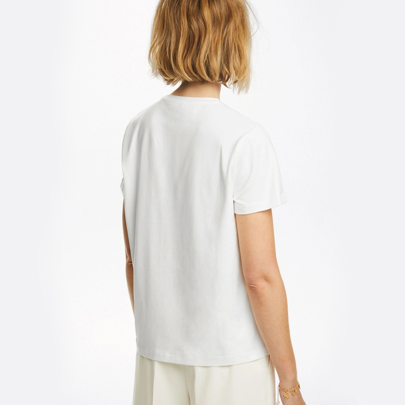 Vêtements pour femmes CH, avec un col rond, orné d'une décoration brodée portant le logo CH, un haut décontracté pour tous les jours