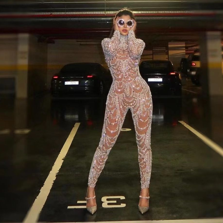 La nouvelle robe pour femmes européennes et américaines 2025 est amincissante et ajustée, avec des paillettes transparentes et un pantalon une pièce sexy