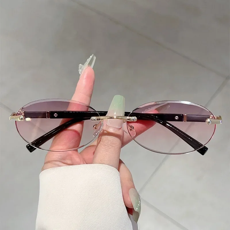 Lunettes de soleil en métal haut de gamme pour femmes et hommes, monture ovale personnalisée, rétro, luxueux, sans cadre, pour voyage, UV400