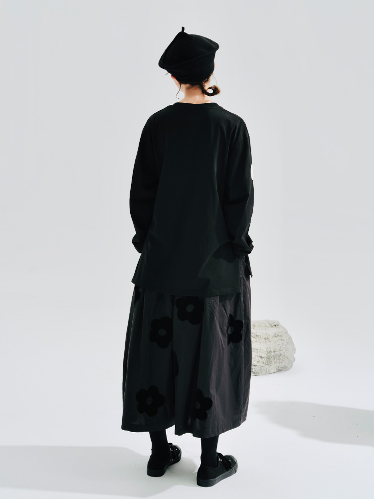 Jupe longue noire pour femme - Style pantalon, broderie florale, idéale pour les sorties décontractées du week-end, ambiance élégante et mystérieuse