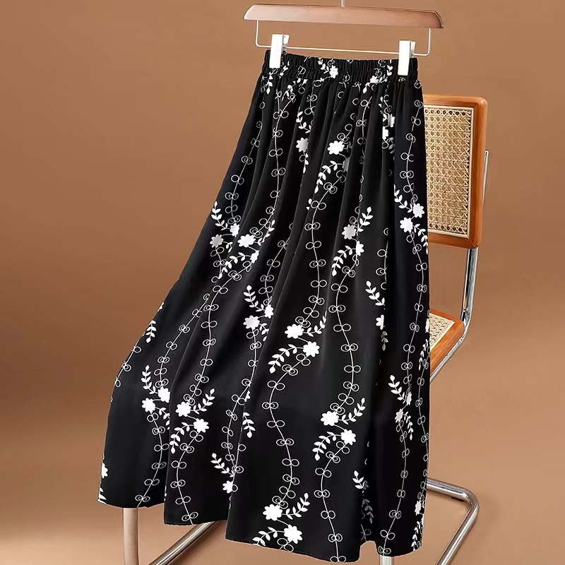 Jupe d'été pour femme en mousseline, style vintage, imprimé floral, taille haute élastique, décontractée, mi-longue, coupe trapèze, pour la plage