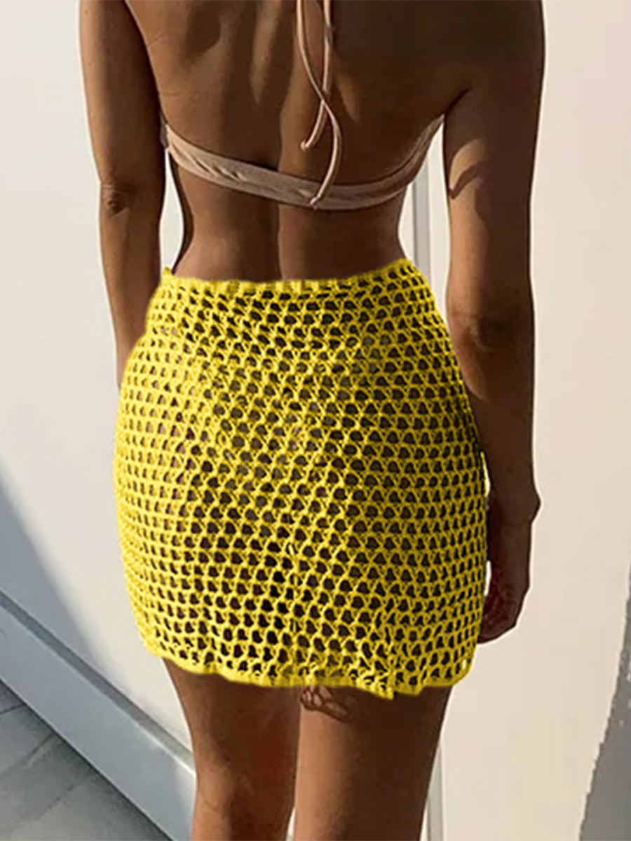 Femmes jupe de plage évidé solide noir blanc jaune vert tricoté Mini jupe pour les femmes vacances d'été bord de mer jupe de couverture
