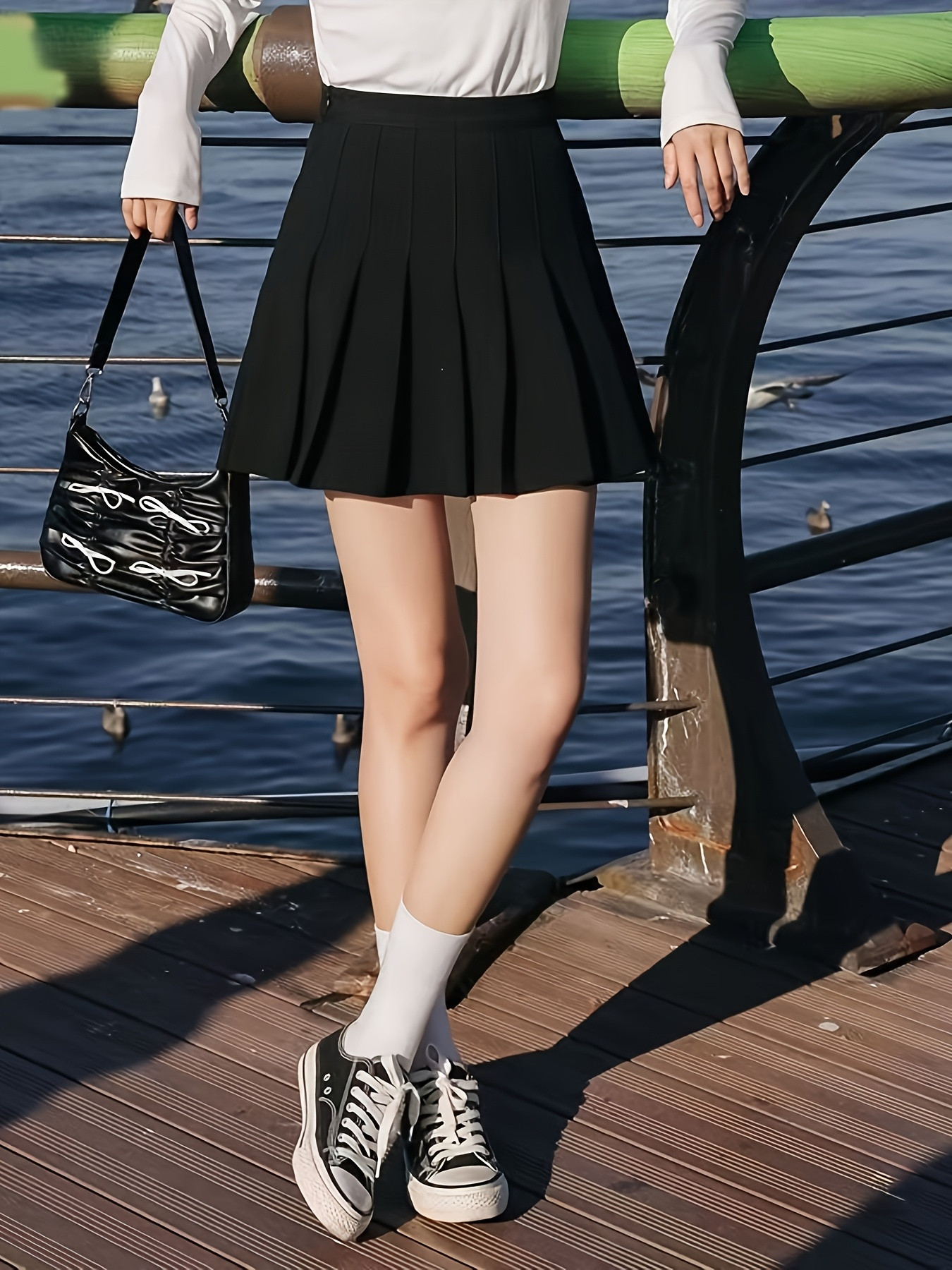 Jupe plissée taille haute pour femme avec short de sécurité, mini-jupe noire style A pour tenues décontractées, de bureau ou scolaires