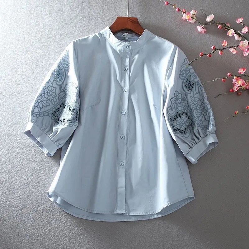 Chemisier femme 2025 printemps été creux lourd broderie dames hauts col montant tempérament dame lâche lanterne manches chemise