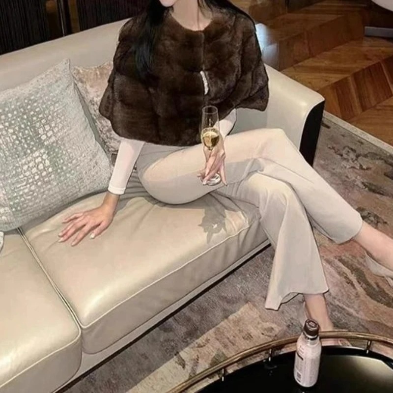 Veste d'hiver femme nouveau en manteaux 2025 automne et hiver nouveau manteau court manteau de fourrure femmes polyvalent court châle fourrure Blouson