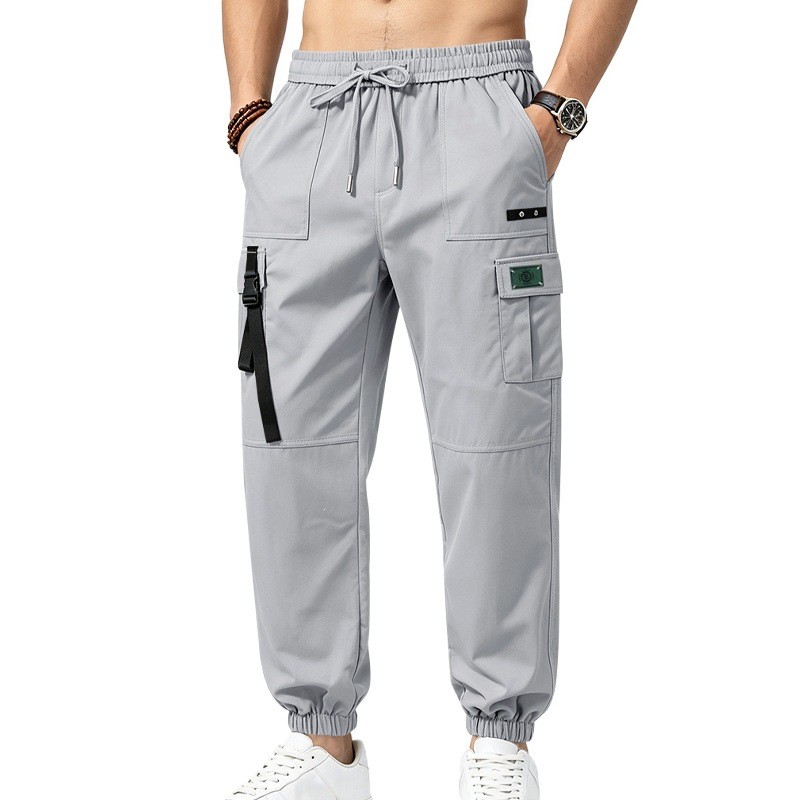 Nouveau pantalon de travail pour homme, style streetwear, avec taille élastique, plusieurs poches, coupe décontractée et tendance