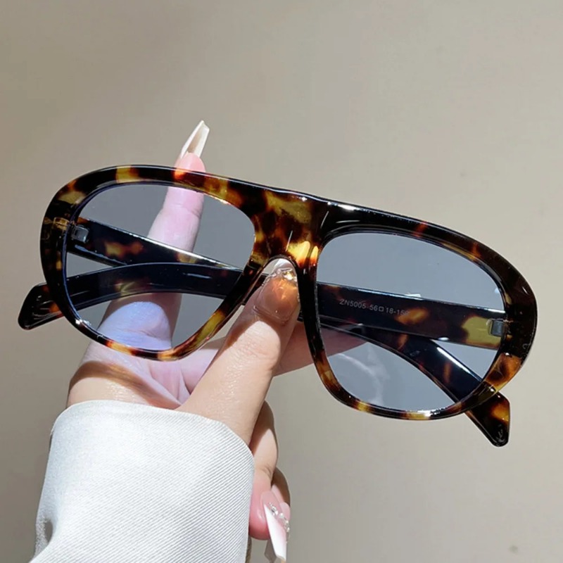Nouvelles lunettes de soleil ovales à dégradé léopard pour femmes, lunettes de soleil vintage élégantes pour hommes, lunettes de soleil d'extérieur UV400, verres noirs