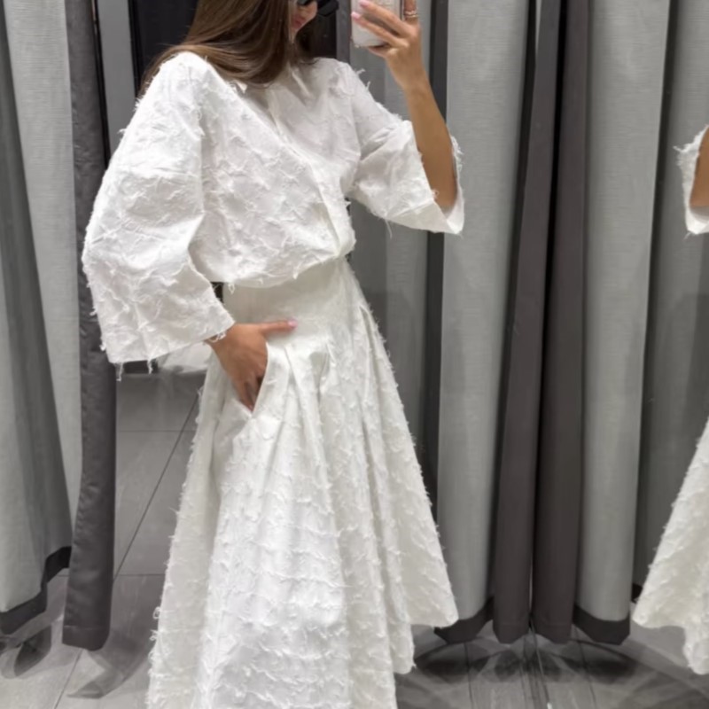 Femmes Design de mode gland Blouse jupe costume élégant blanc revers à manches longues chemise ample a-ligne plissée jupe Midi ensemble assorti