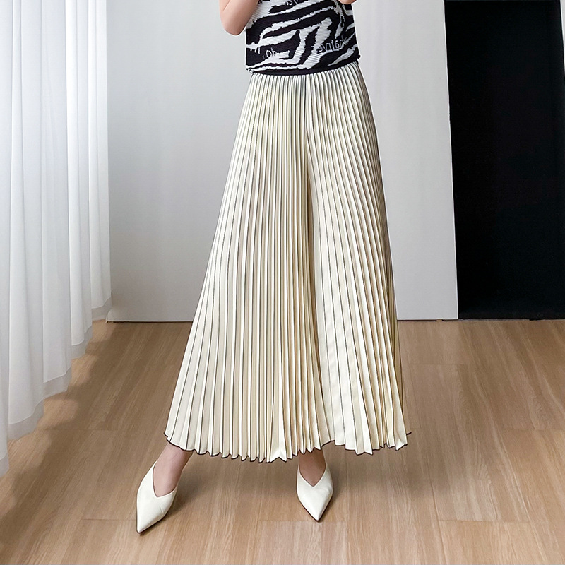 Pantalon jupe à jambes larges pour femmes, confortable, à la mode, décontracté, haut de gamme, simple, ample, été 2025, nouveau design plissé