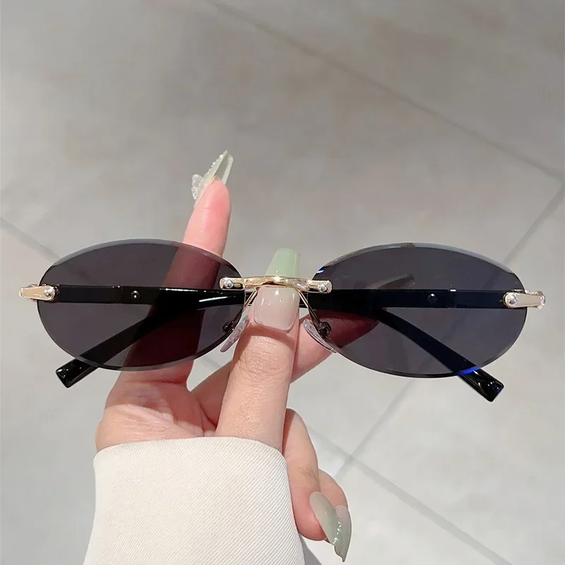 Lunettes de soleil en métal haut de gamme pour femmes et hommes, monture ovale personnalisée, rétro, luxueux, sans cadre, pour voyage, UV400