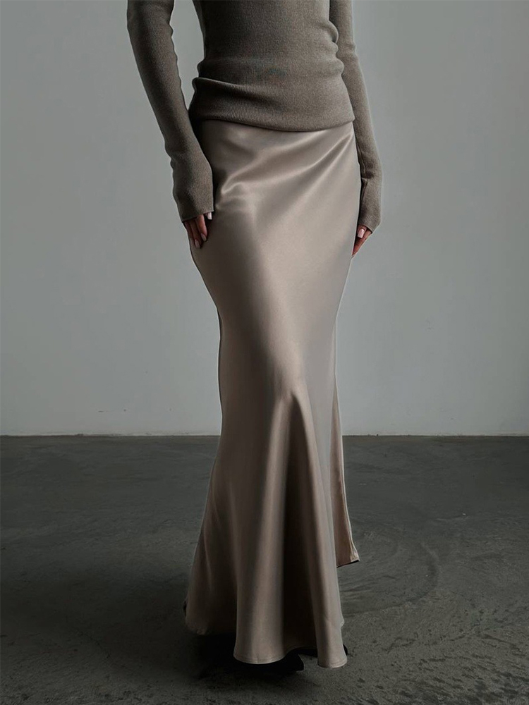 Élégante jupe longue en satin blanc pour femmes, taille haute, coupe ajustée, style queue de poisson, jupe maxi 2026, nouvelle collection décontractée pour le quotidien, le travail et le bureau.