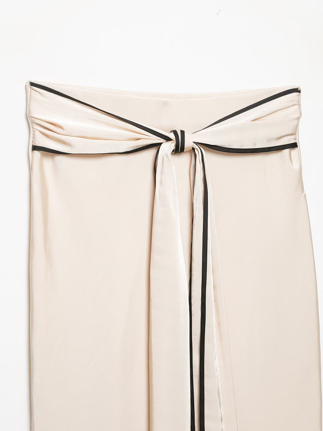 Nouvelle jupe MIDI pour femmes, style européen et américain, tendance 2026, polyvalente, avec décoration en nœud, en satin de soie.