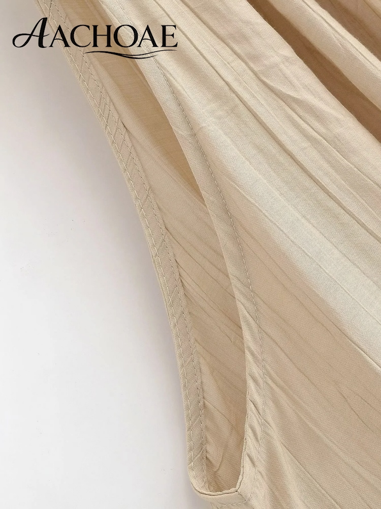 Chemisier plissé bohème perlé à col halter sans manches pour femme, coupe ample, élégant, idéal pour les vacances d'été